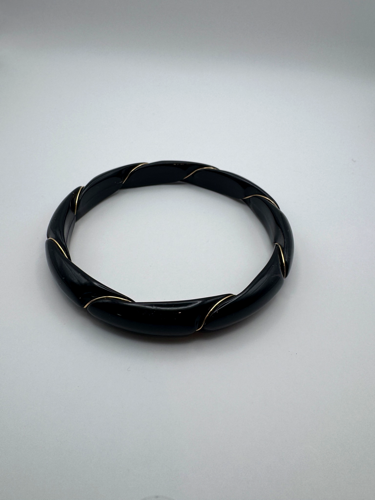 Vintage Unmarked Black Twisted Bangle Bracelet with Gold Tone Accents, 3"