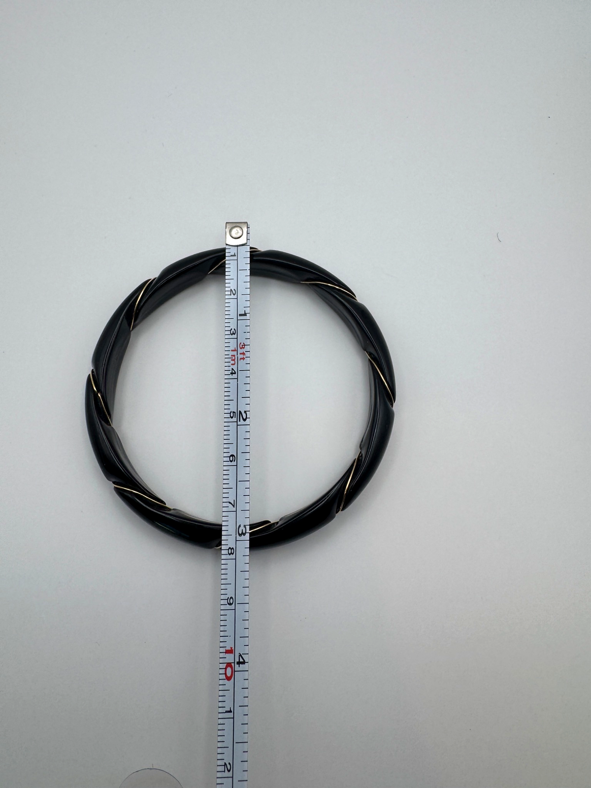 Vintage Unmarked Black Twisted Bangle Bracelet with Gold Tone Accents, 3"