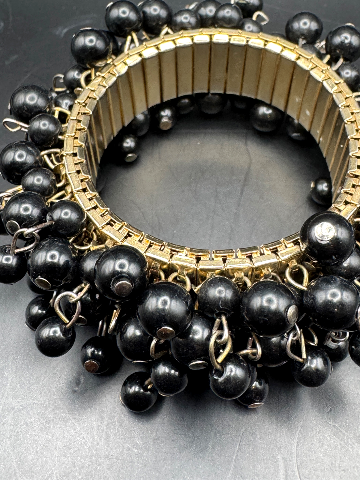 Vintage Unsigned Black Bead Cha-Cha Cluster Stretch Bracelet, Gold Tone