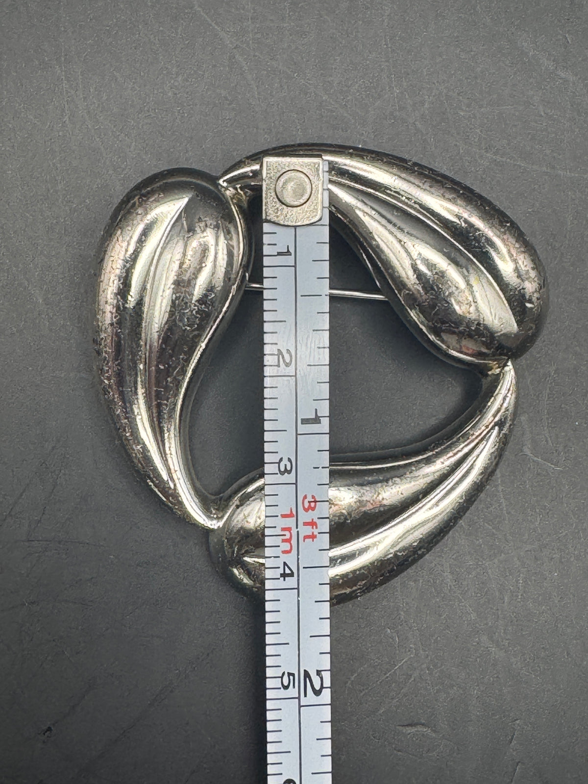 Monet Signed Silver-Tone Sculptural Leaf Swirl Brooch