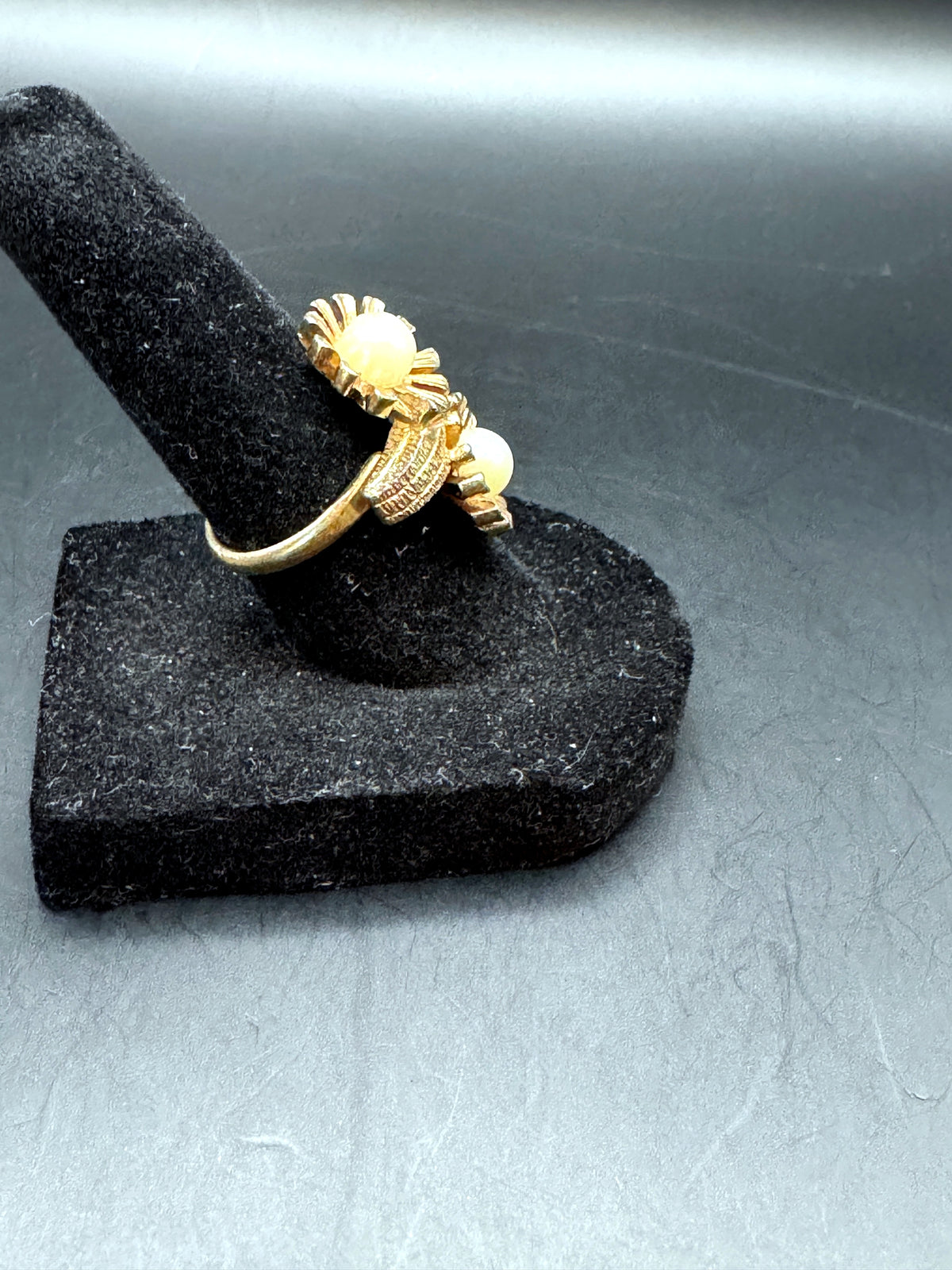 Unbranded gold-tone adjustable double-flower ring, alternate side view
