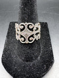 Unbranded silver-tone adjustable ring with ornate scrollwork front view
