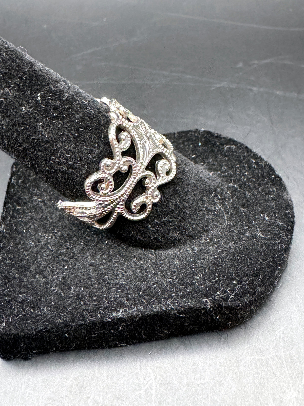 Unbranded silver-tone adjustable ring side detail